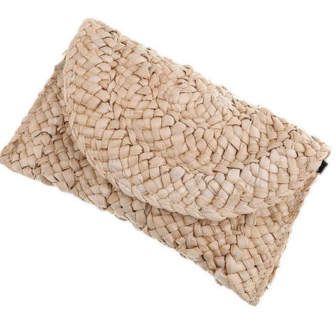 Handwoven straw and rattan clutch purse